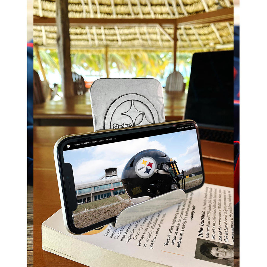 Styled display featuring Pittsburgh Steelers Phone Holder