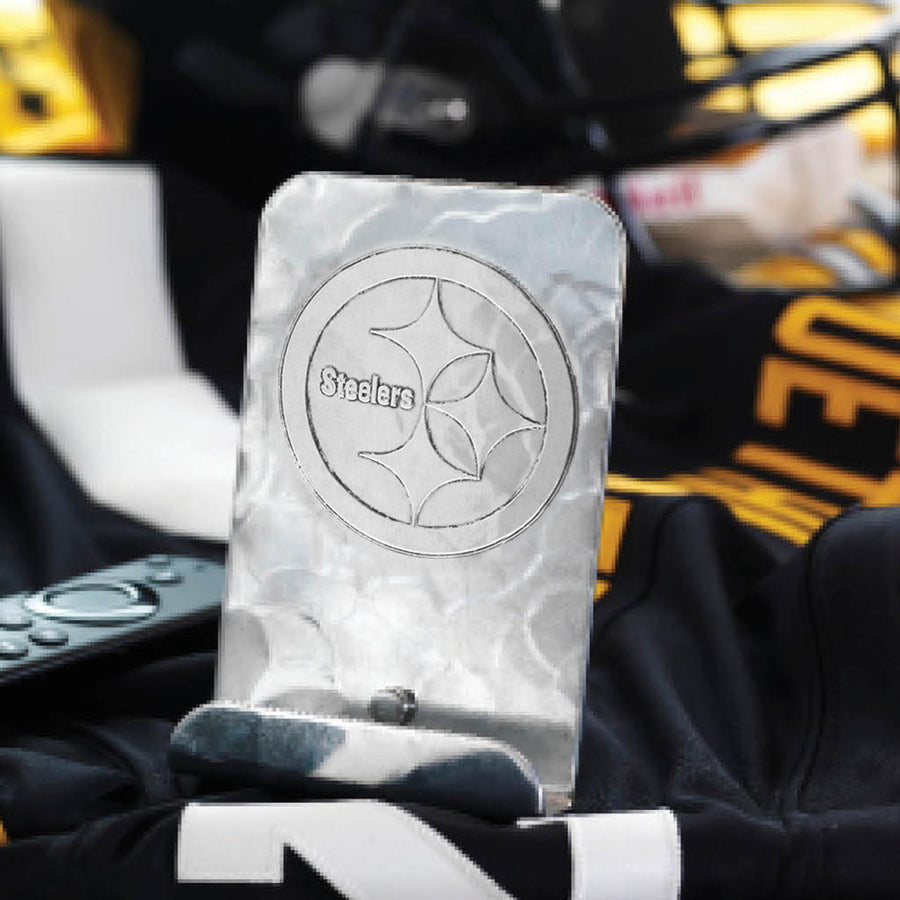 Styled display featuring Pittsburgh Steelers Phone Holder
