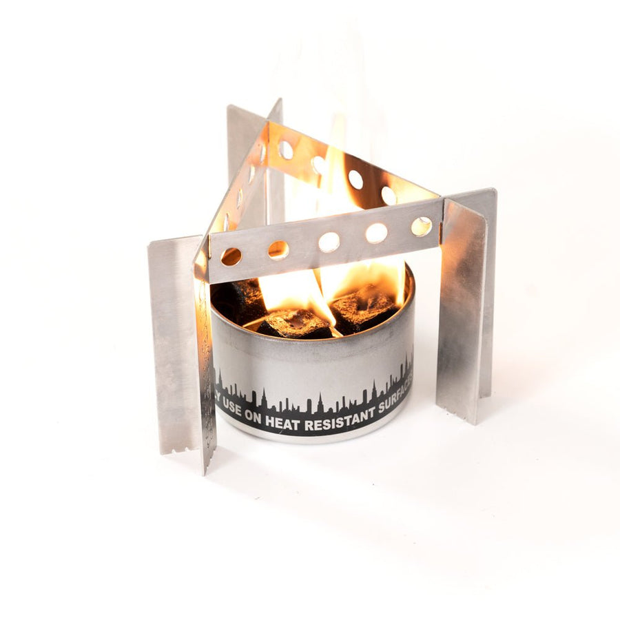 Assembled camp stove around a portable bonfire