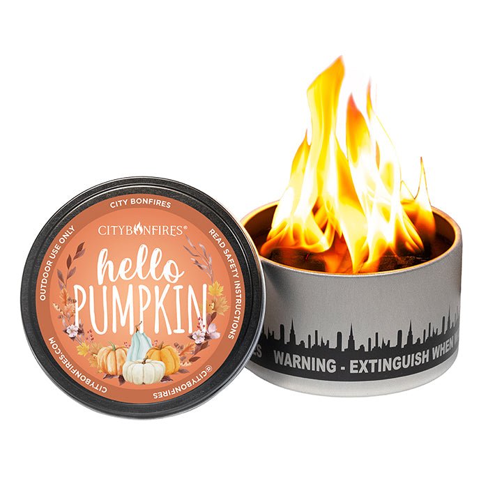 Hello Pumpkin lid beside a lit portable bonfire