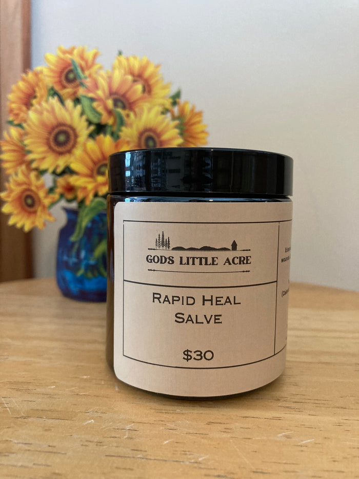 Calendula Herbal Salve in its amber glass jar with supplier branding