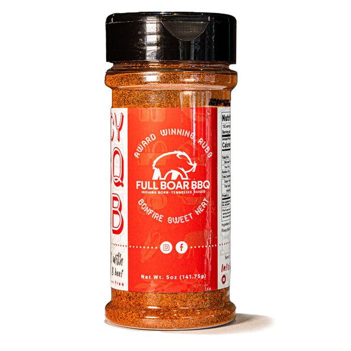 Bonfire Sweet Heat BBQ rub bottle with a red label and black shaker cap.