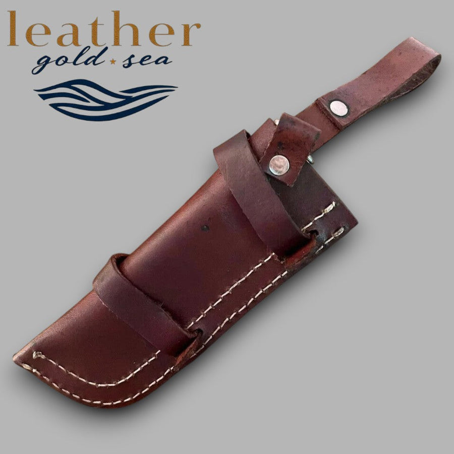 Reverse view of dark brown sheath and attachment straps