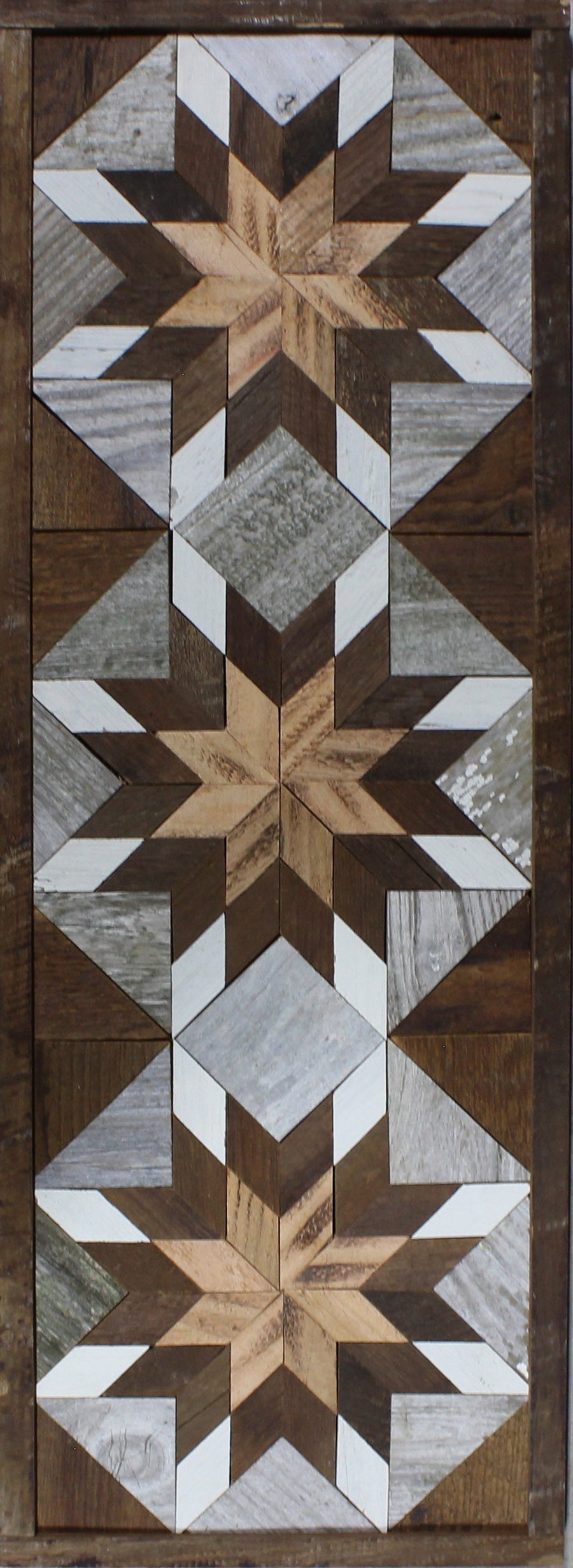 Tall reclaimed-wood barn quilt banner with a hand-painted geometric star design