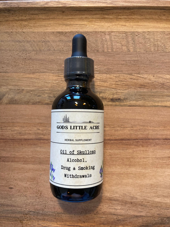Skullcap in Olive Oil in its amber glass bottle with dropper with supplier branding