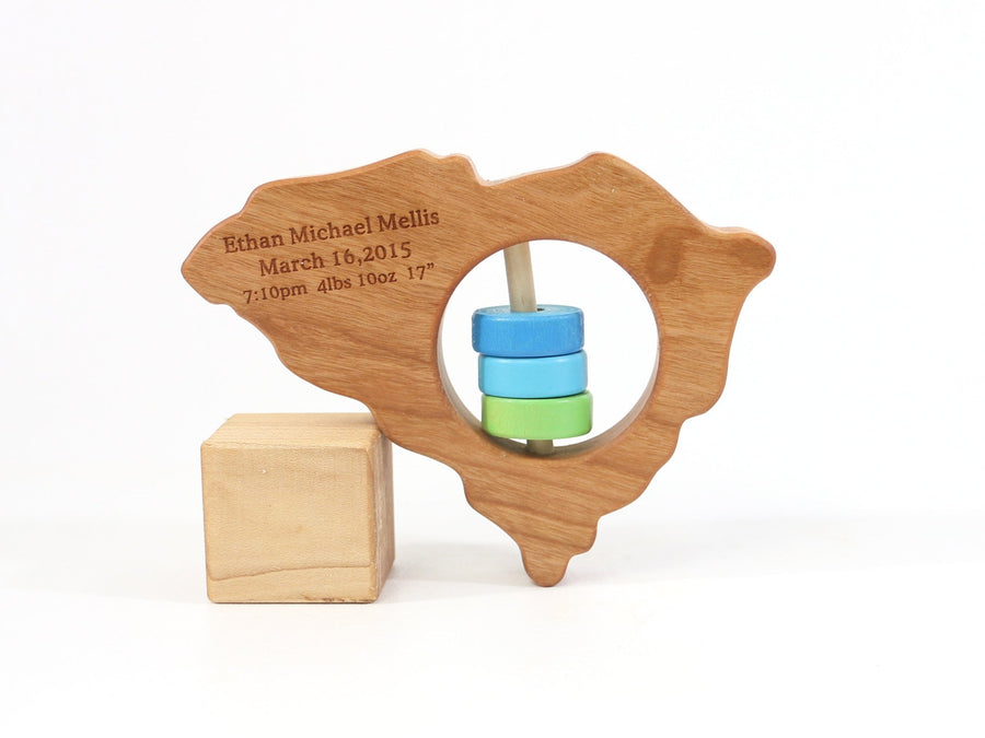 South Carolina cherry wood rattle with an example of engraved personalization