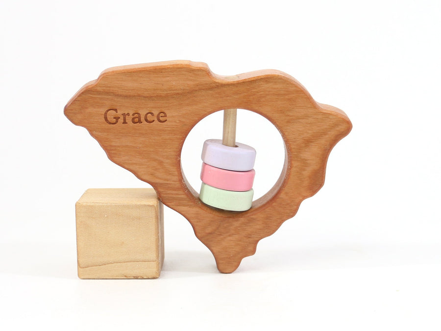 South Carolina cherry wood rattle with an example of engraved personalization