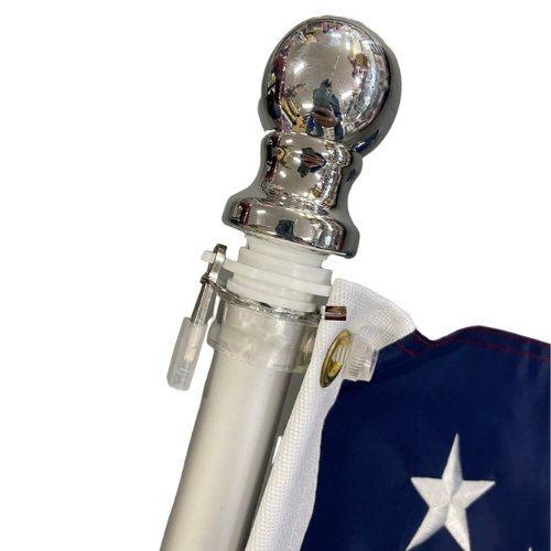 Silver spinning flagpole with ball finial and American flag attachment
