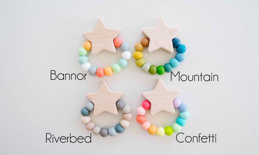 Star charm teether examples showing several silicone bead color combinations