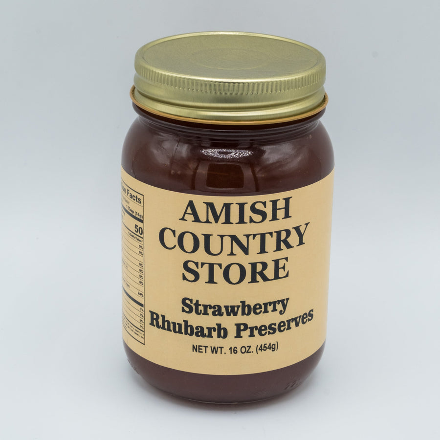 Strawberry rhubarb preserves jar labeled net weight 16 oz; supplier listing size requires verification.