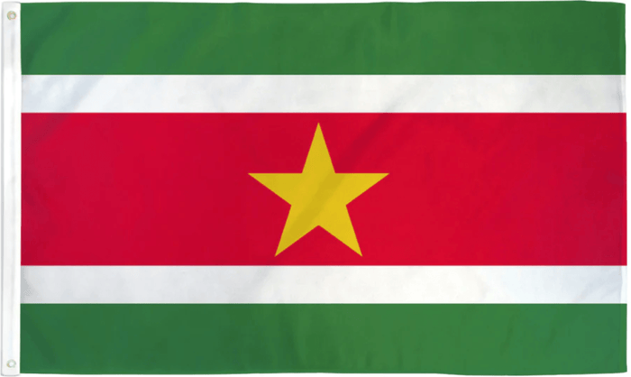Suriname flag made in USA with green white red bands and central yellow star