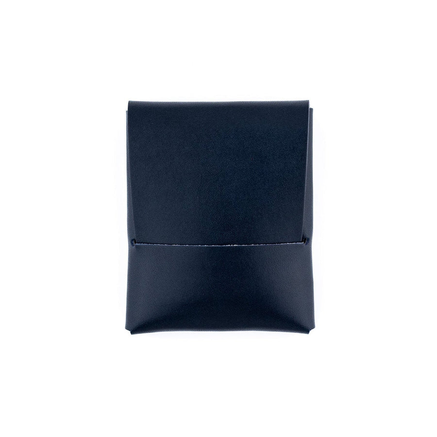 Navy Franklin leather wallet, closed front view with tuck flap