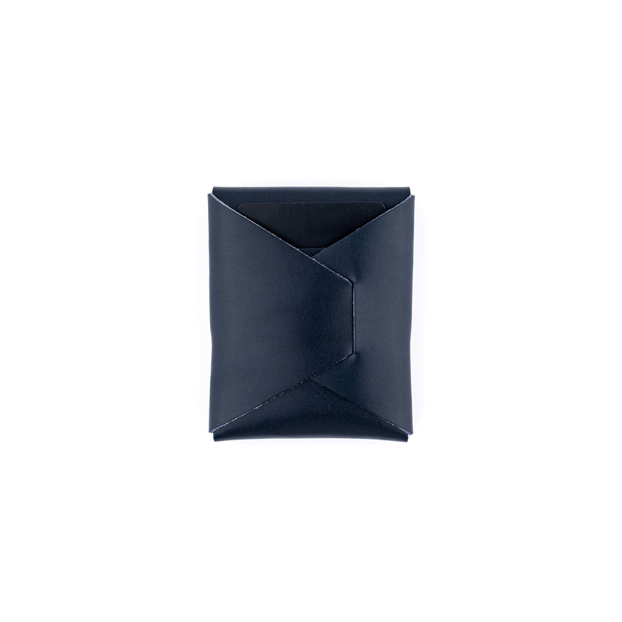 Navy Franklin leather wallet, rear view of folded leather construction