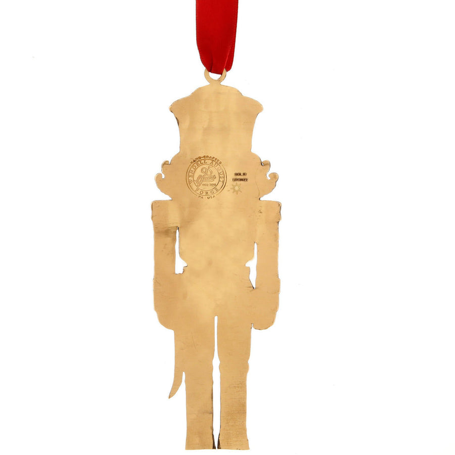 Reverse-side view of Nutcracker Prince Christmas Ornament - Bronze