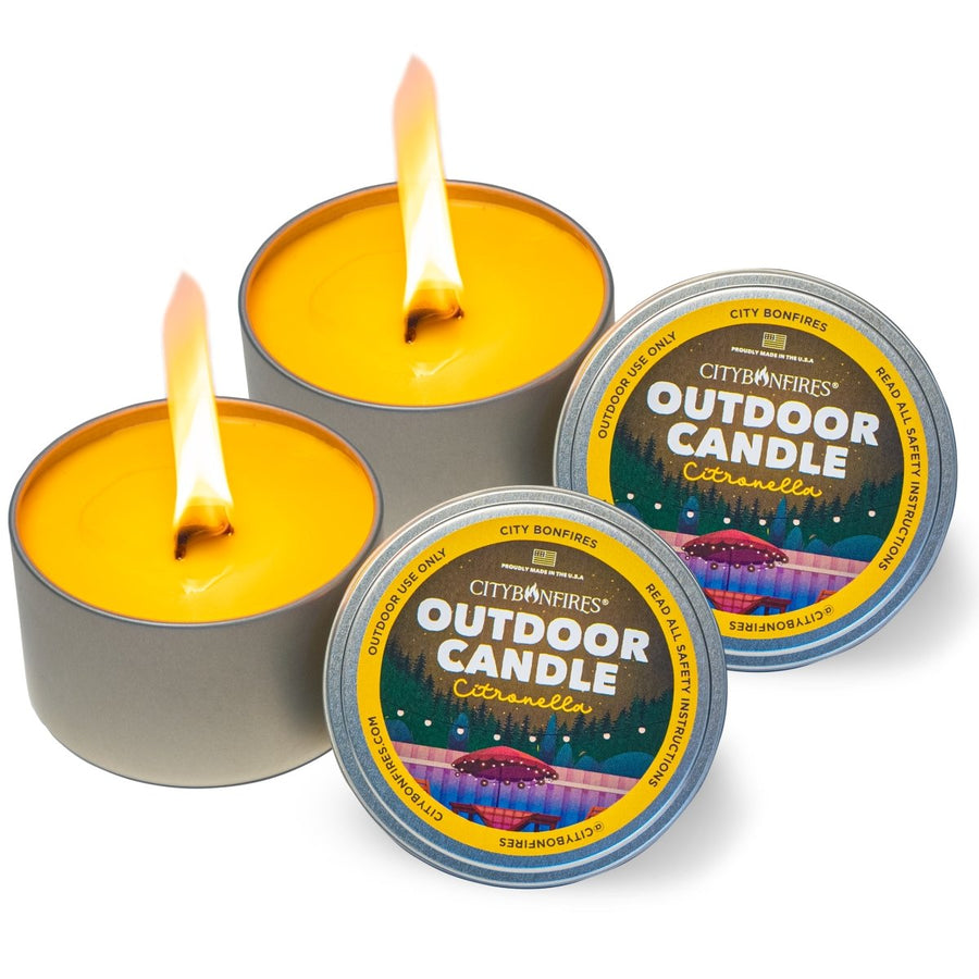 Two lit citronella candles with labeled lids