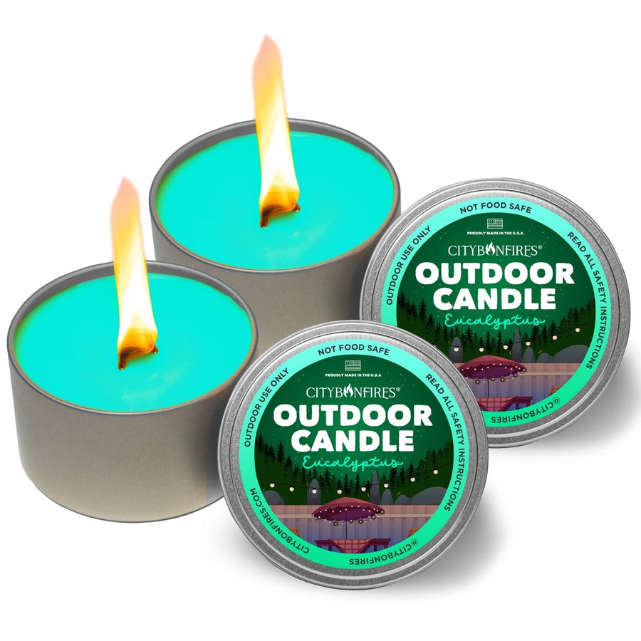 Two eucalyptus outdoor candles with labeled lids