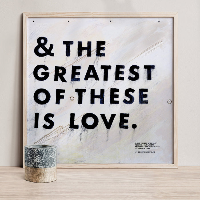 The Greatest of These Is Love art print with bold black lettering.