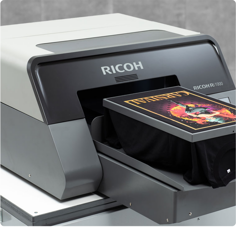 Ricoh garment printer shown as a DTG workflow example