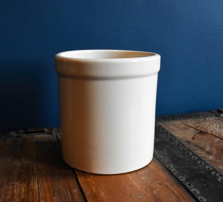 Bristol off-white stoneware utility crock - 2 quart tall on a wood surface