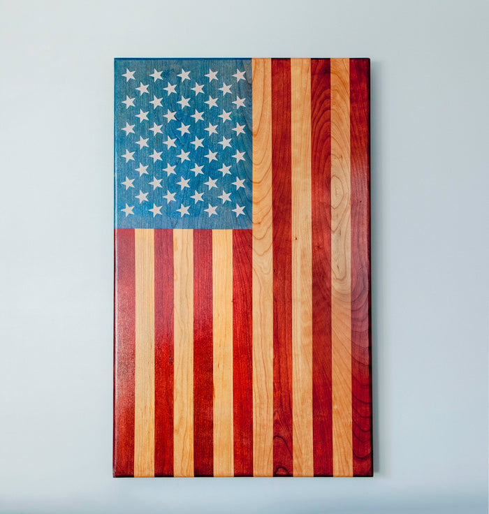 Vertical wooden American flag wall art handcrafted from cherry hardwood and made in USA by U.S. veterans