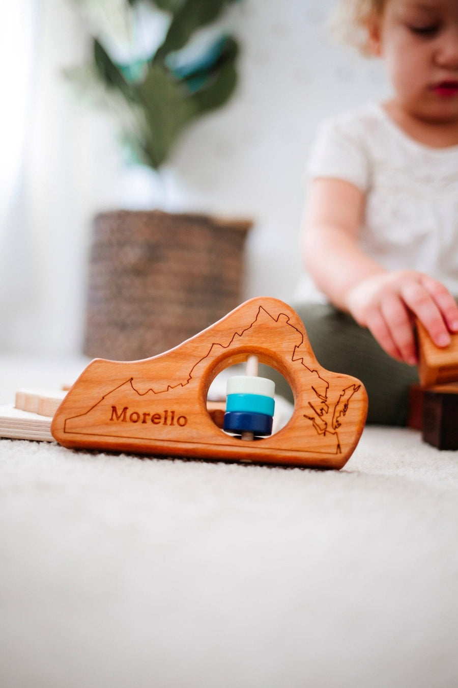 Virginia cherry wood rattle in a lifestyle setting