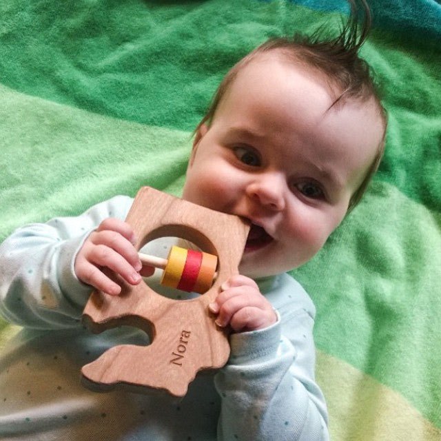Washington cherry wood rattle in a lifestyle setting