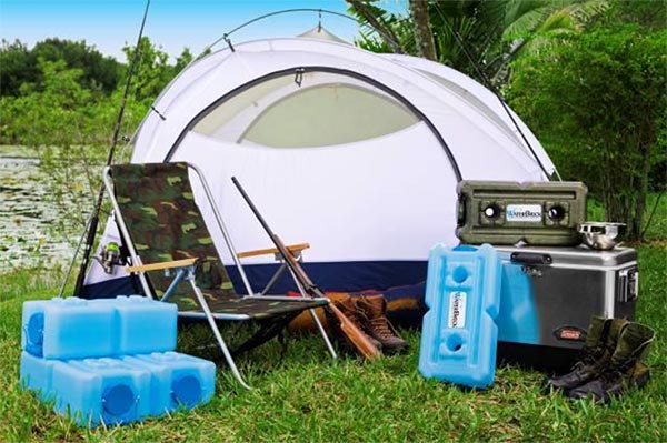 WaterBrick containers beside a tent and camping stove