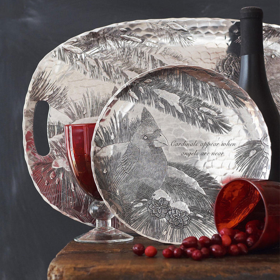 Collection display featuring Winter Cardinal Round Plate