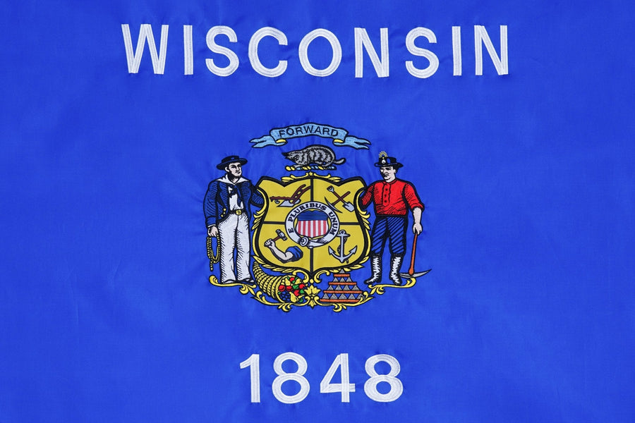 Wisconsin state flag close-up with coat of arms WISCONSIN and 1848